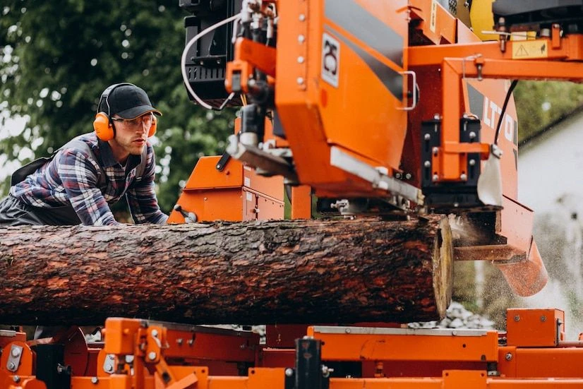 carpenter-working-on-a-sawmill-on-a-wood-manufacture_1303-22887.jpg